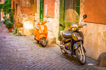 Fototapeta na wymiar old town italian street with bykes in Trastevere, Rome, Italy, retro toned
