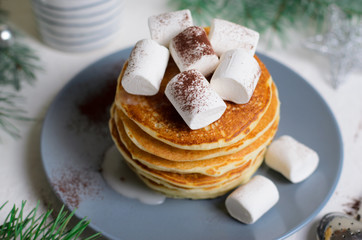 Pancakes with Marshmallow on Winter Background, Christmas Dessert