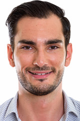 Fototapeta premium Face of happy young handsome businessman smiling