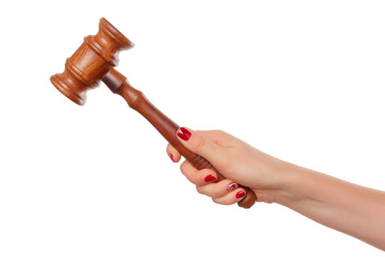 Woman Holding Wooden Gavel in Her Fist Isolated on a White Background