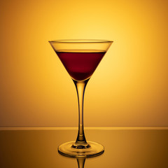 glass of wine on the glass table
