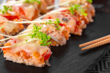 fresh sushi on rustic wooden table