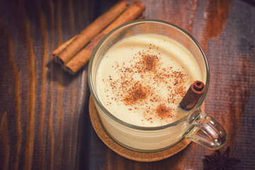Two Glass of Eggnog with Cinnamon and Nutmeg for the Christmas