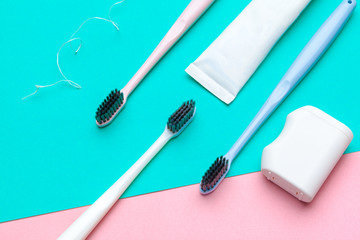 Flat lay composition with manual toothbrushes on color background, close up