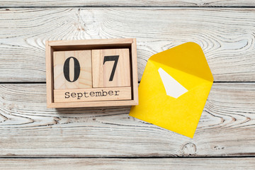 September 7th. Image of september 7 wooden color calendar on wooden background. Autumn day. Empty space for text