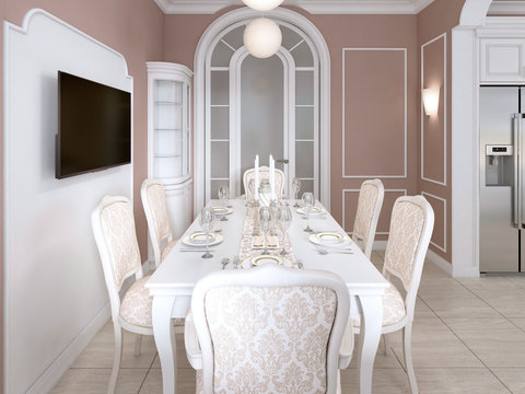 Dining Room With White Table And Chairs For Six People With Two Sideboards And A TV.