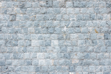 Grey stone wall tile texture background