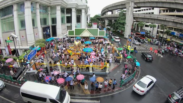 Time lapse of Erawan Shrine, Famous place for worship Hindu god in front of Grand Hyatt Erawan Hotel