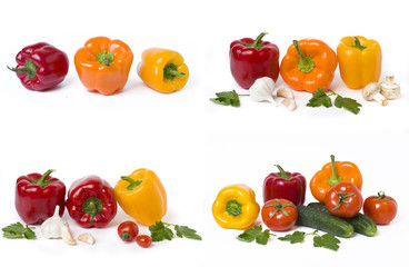 Red yellow and orange peppers with tomatoes on a white background..Multicolored vegetables in a composition on a white background..