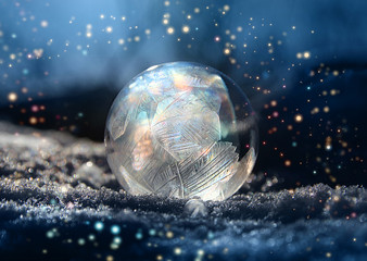 Magic frostball with snowflake glitter around