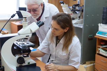 Health care researchers working in life science laboratory.