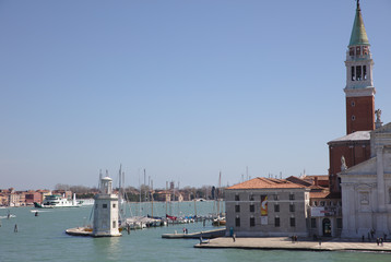 Fototapeta na wymiar View from Venice car ferry of small harbour and San Giorgio 4236