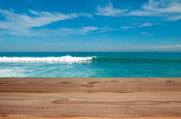 empty wooden tabletop on the ocean background