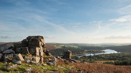 Stunning Autumn sunset landscape image of view from Leather Tor towards Burrator Reservoir in Dartmoor National Park