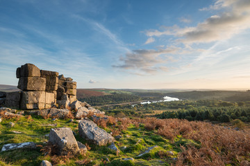 Fototapeta premium Stunning Autumn sunset landscape image of view from Leather Tor towards Burrator Reservoir in Dartmoor National Park