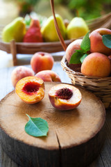 fresh peaches on a wooden table