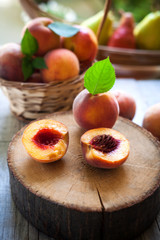 Fototapeta na wymiar peaches on a wooden table