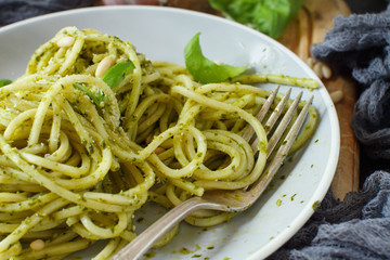 Spaghetti pasta with pesto sauce