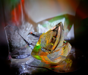 Colorful pieces of ice, painted with light..Still life, abstraction, background, texture