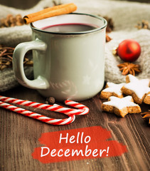 Winter theme. Hot steaming cup of glint wine with spices