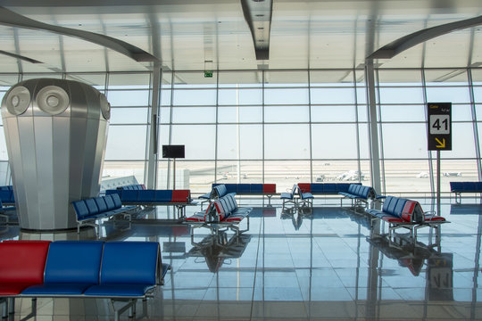 Airport Terminal with empty chairs, departure area