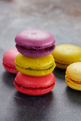 macaroons on a dark table