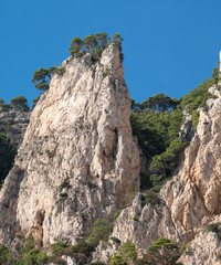 Cliff scenery and rock formations on the island of Capri in the Bay of Naples, Italy. Photographed whilst on a boat trip around the island.