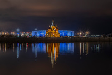 Fototapeta na wymiar Europe, Russia, the city of Nizhny Novgorod, the Olympic Stadium, the temple, Alexander Nevsky Cathedral, night, river, Volga, Oka