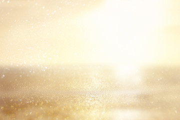 Fototapeta premium glitter vintage lights background. silver and gold. de-focused.