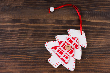 Christmas ornament flat lay on stained wooden background