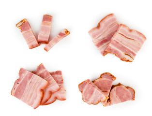 Pieces of bacon in different compositions close-up, top view.