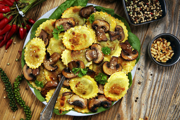 Ravioli with spinach or Pumpkin Tortellini with chard and mushrooms.