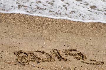  2019 on the seashore. With the words 