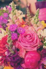 Natural macro background of fresh arranged flowers, retro toned
