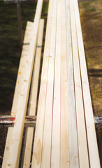 Fototapeta na wymiar Cut and planed wood ready for further use.