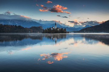 Fototapeta na wymiar Lake Bled with St. Marys Church of the Assumption on the small island; Bled, Slovenia, Europe.
