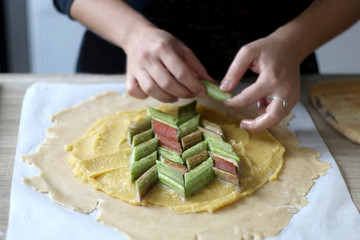 Making a sweet rhubarb galette. Selective focus. 