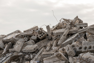  destroyed building - concrete and metal debris of a destroyed building - destroyed building