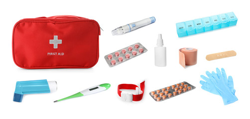 Medical items and red case on white background. Packing first aid kit
