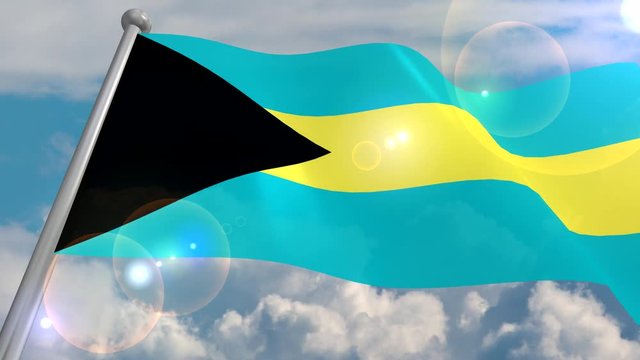 The flag of the State of the Bahamas develops in the wind against a blue sky with cumulus clouds and a flash on the lens from the sun. 4K video is looped and decoded from a 3D program.
