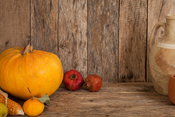 pumpkin over wooden background