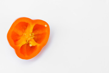 top view food isolated on white background. orange pepper slice.
