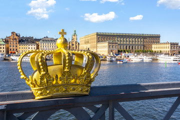 Stockholm old town (Gamla Stan) with Royal palace and Royal crown, Sweden