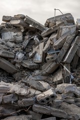  destroyed building - concrete and metal debris of a destroyed building - destroyed building