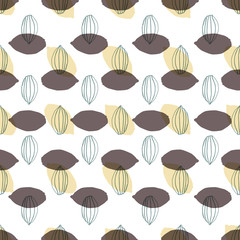 Modern stylized cocoa pods shapes in a geometric arrangement seamless vector pattern background.