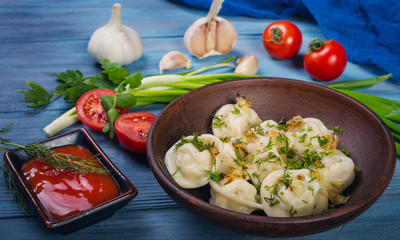 Dumplings in clay plate