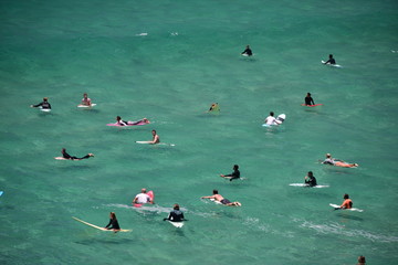 Surfers Waiting for the Great Wave