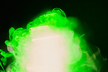 Water vapor with the effects of the laser beam and a multicolored light