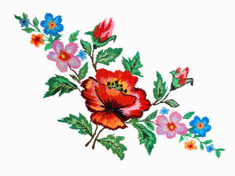 Ukrainian embroidery, embroidered delicate flowers on white fabric