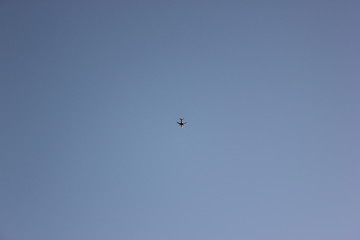 plane in the blue sky